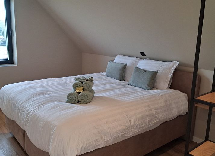 't Laarhuys ***** in Vlaamse Ardennen, Belgie biedt een moderne keuken in een luxe vakantiehuis met prachtig uitzicht op de omgeving.