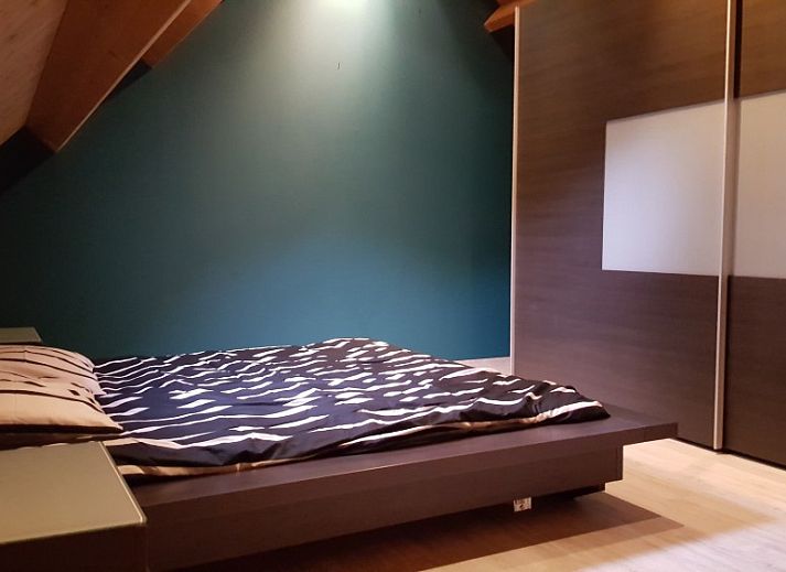 Gemuetliches Esszimmer im Relaxation House, Ferienhaus in Ursel, Ostflandern mit Holzinterieur.