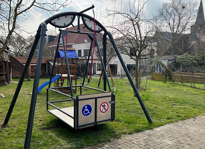 Spacious dining room at DE KLEPPE vacation rental in Brakel, perfect for group meals and gatherings.