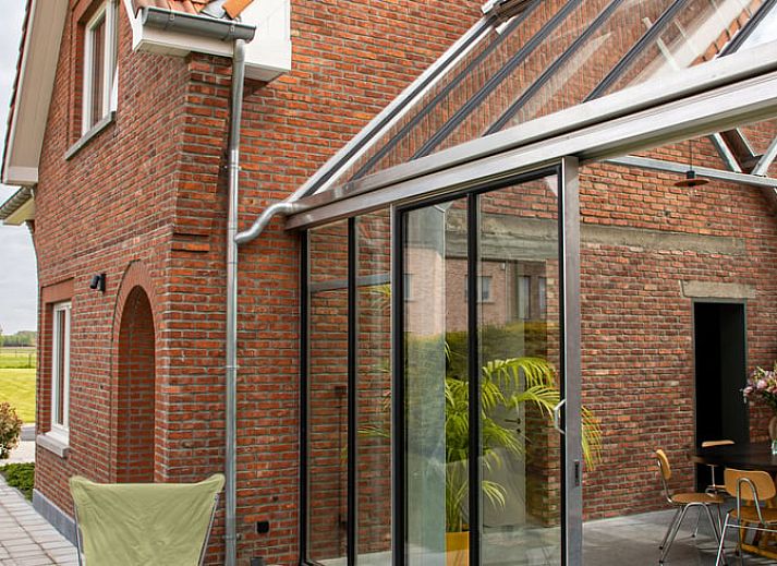 Ferienhaus in Sint-Pauwels mit Glasveranda, gelegen im gruenen Ostflandern, Belgien.