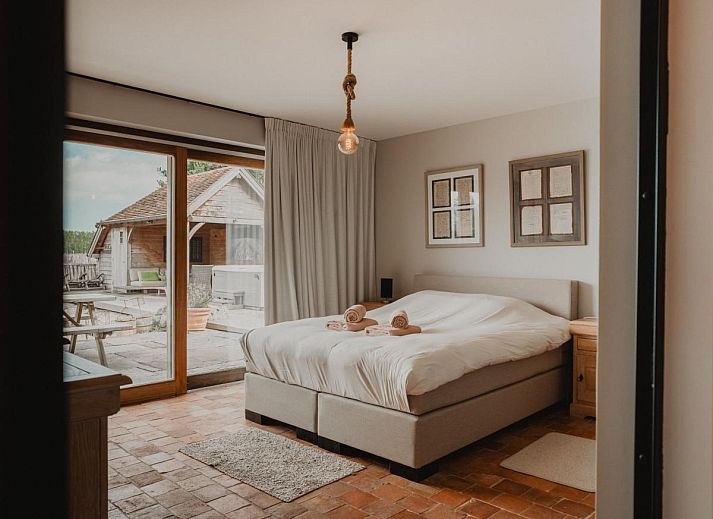 Villa Noortem, een charmant vakantiehuis in Maldegem, Oost-Vlaanderen, met een ruim terras en gezellige buitenruimte.