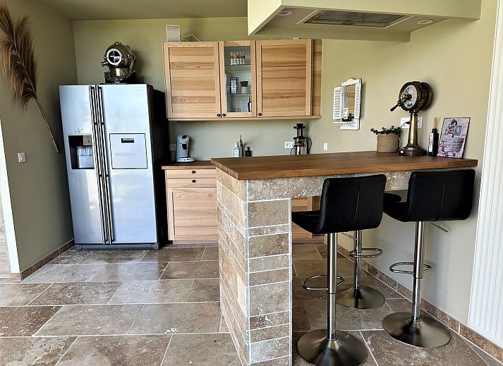 Relax in the luxurious Jacuzzi at Holiday Home Einzigartiger Wellness-Bauernhof in Wichelen, East Flanders, a perfect wellness experience.