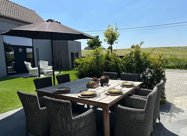 Relax in the luxurious wellness area of Holiday Home Einzigartiger Wellness-Bauernhof in Wichelen, East Flanders, with hot tub and rustic atmosphere.