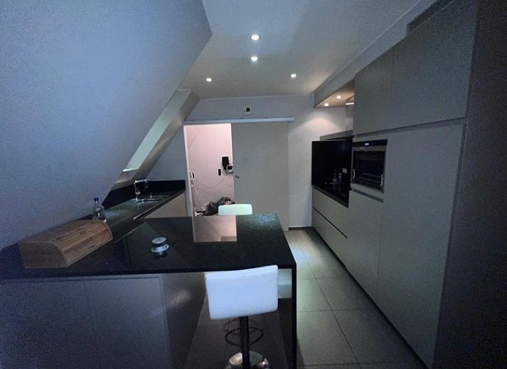 Stijlvol appartementinterieur bij / in Bevere, Oost-Vlaanderen, Belgie, met ruime woonkamer en moderne inrichting.