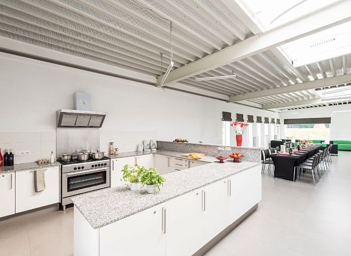 Children enjoy the pool at Lozer Lodge, a vacation home in Kruisem, East Flanders.