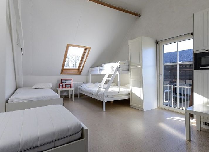Children enjoy the pool at Lozer Lodge, a vacation home in Kruisem, East Flanders.