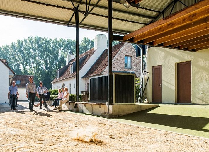 Children enjoy the pool at Lozer Lodge, a vacation home in Kruisem, East Flanders.