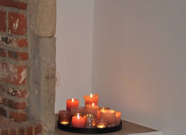 Vakantiehuisje in Landskouter-Oosterzele met charmante gevel en groene tuin in Oost-Vlaanderen, Belgie.