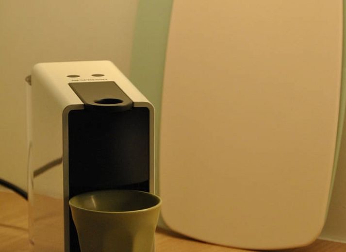 Stijlvolle verlichting en houten balken in Vakantiehuisje in Landskouter-Oosterzele, Oost-Vlaanderen, Belgie.