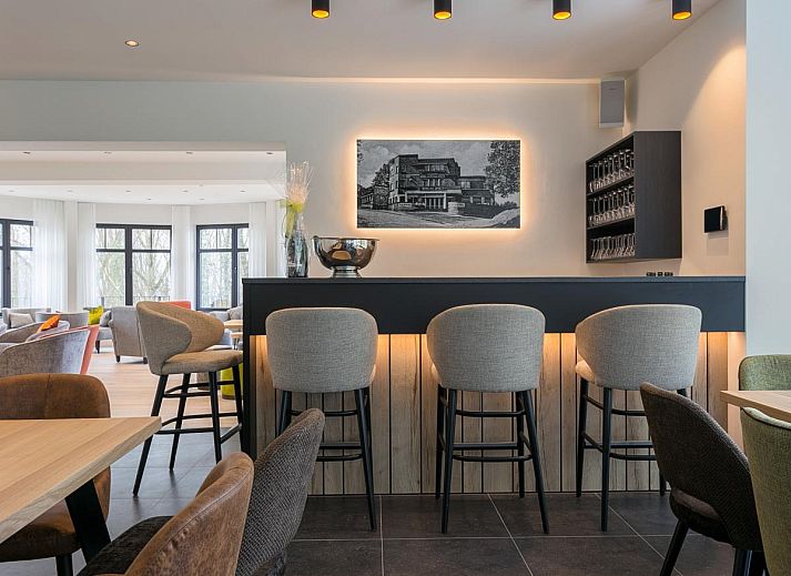 Villa Col 38, een prachtig vakantiehuis in Kluisbergen, Oost-Vlaanderen, omgeven door weelderige natuur en een uitgestrekte tuin.