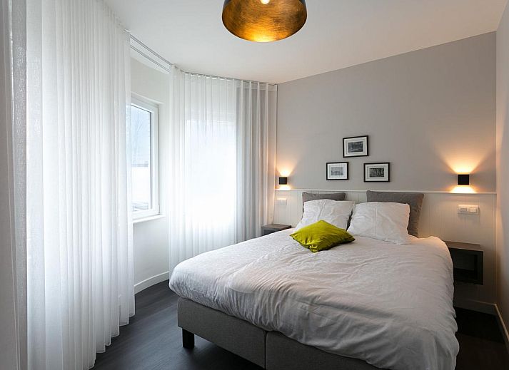Stijlvolle woonkamer in Villa Col 38, Kluisbergen, Belgie, met moderne inrichting en ruime zithoek voor ultiem comfort in dit vakantiehuis.