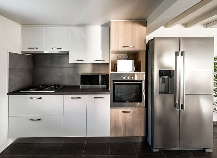 Blick vom Ferienhaus in Ronse, gelegen in den gruenen Huegeln der flaemischen Ardennen, Ostflandern, Belgien.