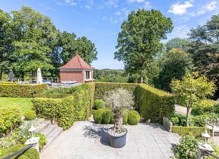 Gemuetliche Sitzecke mit Kamin im Ferienhaus Boeckhaege, Ronse, Ostflandern, ideal zum Entspannen.