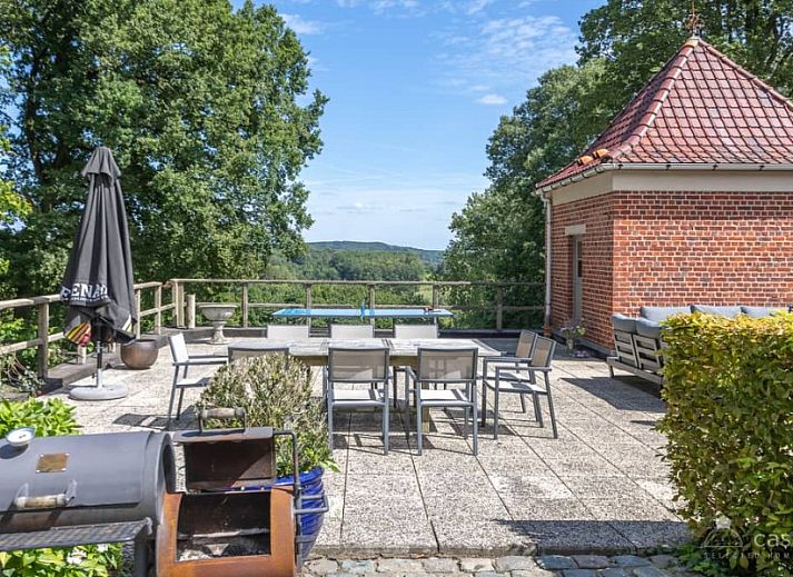 Gemuetliche Sitzecke mit Kamin im Ferienhaus Boeckhaege, Ronse, Ostflandern, ideal zum Entspannen.