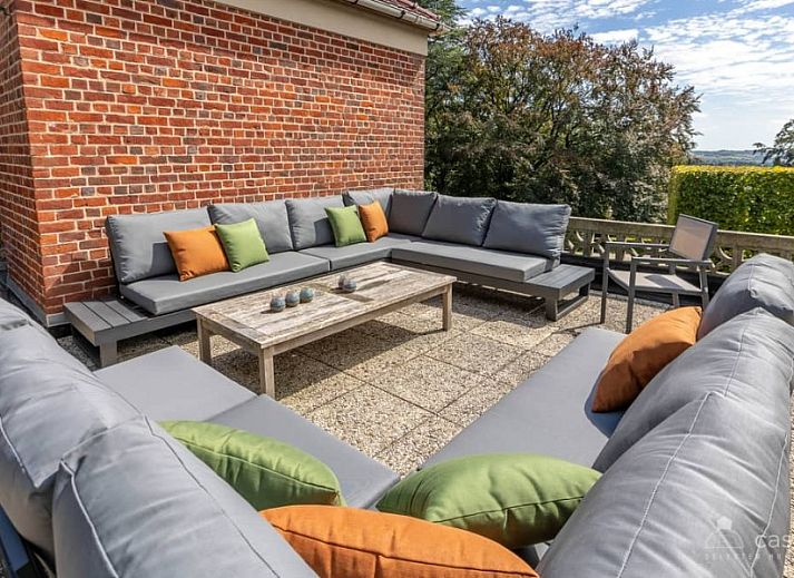 Gemuetliche Sitzecke mit Kamin im Ferienhaus Boeckhaege, Ronse, Ostflandern, ideal zum Entspannen.