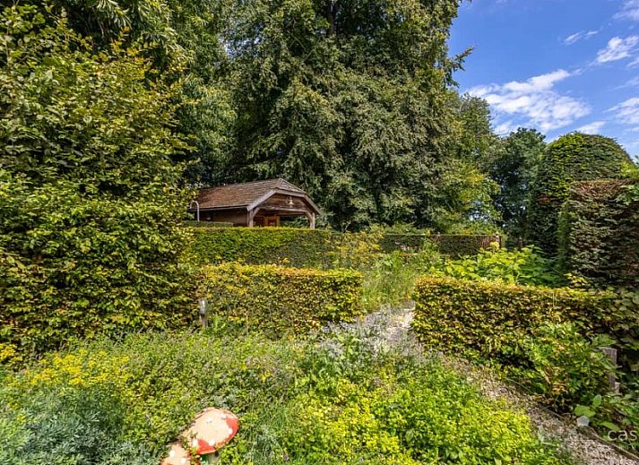 Gemuetliche Sitzecke mit Kamin im Ferienhaus Boeckhaege, Ronse, Ostflandern, ideal zum Entspannen.