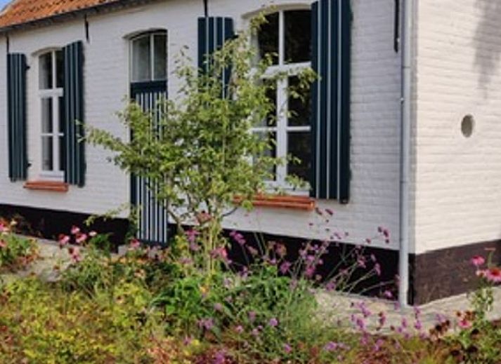 Ferienhaus Ferienhaus in Gavere Dikkelvenne, Ostflandern, umgeben von einem bluehenden Garten und ruhiger Natur.