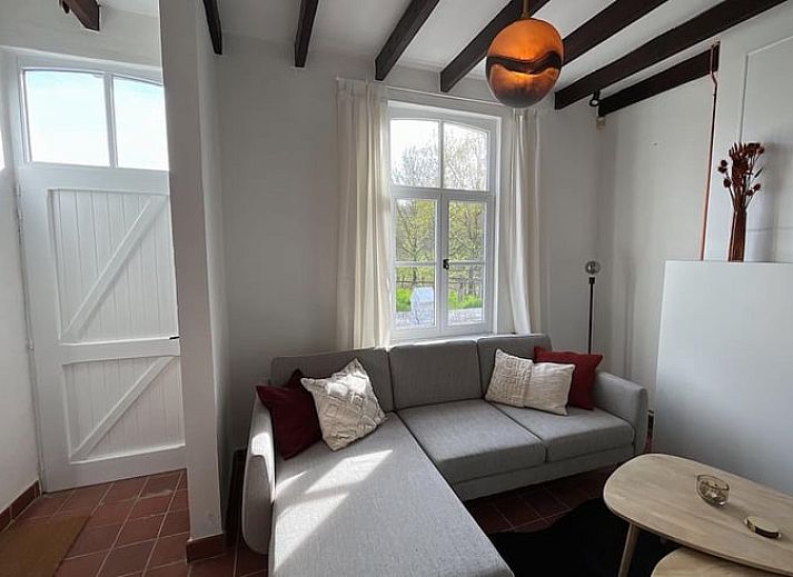 Ferienhaus Ferienhaus in Gavere Dikkelvenne, Ostflandern, umgeben von einem bluehenden Garten und ruhiger Natur.