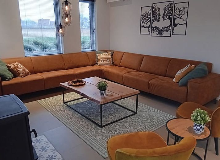 Ferienhaus in Merendree in Ostflandern, Belgien, umgeben von gruener Natur und charmanter Architektur.