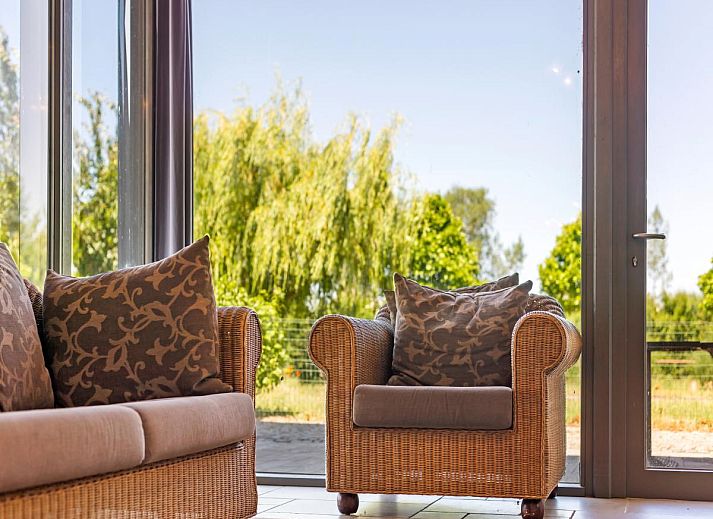 Veranda of Quanto A vacation home in Geetbets, Flemish Brabant overlooking green nature.