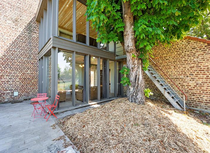 Spacious interior of Quanto A vacation home in Geetbets, Flemish Brabant with cozy sitting area.