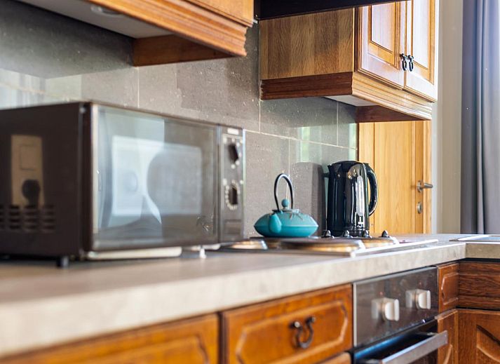 Spacious interior of Quanto A vacation home in Geetbets, Flemish Brabant with cozy sitting area.