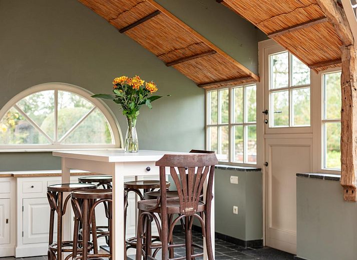 Vakantiehuis Alverwege in Merksplas, Antwerpen, met ruime tuin en traditionele architectuur, ideaal voor een ontspannen verblijf in Belgie.