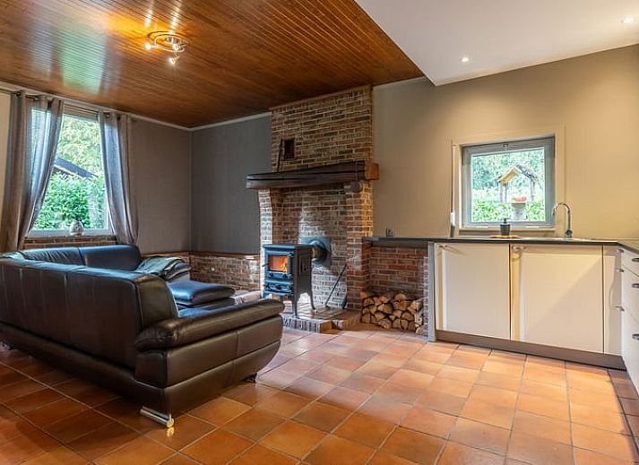 Attractive bedroom in Cottage in Merksplas, vacation home in Antwerp, with comfortable bed and rustic details.