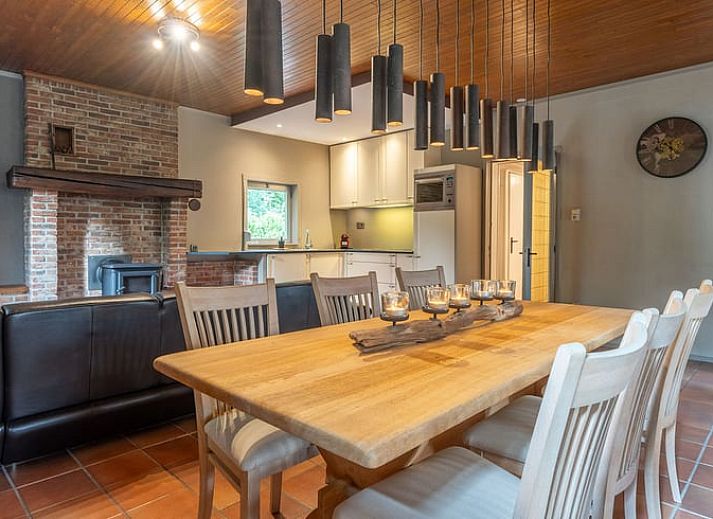 Attractive bedroom in Cottage in Merksplas, vacation home in Antwerp, with comfortable bed and rustic details.