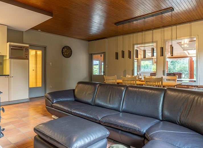 Cozy living room with wood stove in Cottage in Merksplas, vacation home in Antwerp, for cozy evenings.