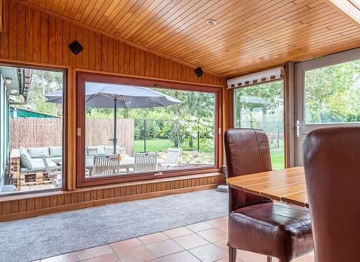 Cozy living room with wood stove in Cottage in Merksplas, vacation home in Antwerp, for cozy evenings.