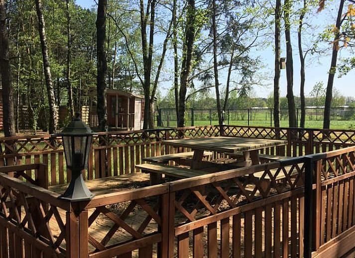 Cottage in Merksplas, cottage in Antwerp with campfire spot and rainbow in green surroundings.