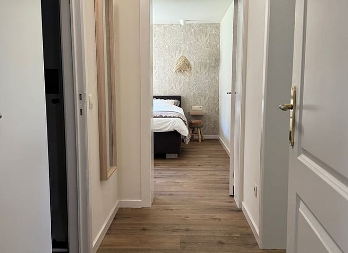 Vacation home in Merksplas, Antwerp, offers a cozy outdoor area with terrace surrounded by green nature for a relaxing stay.