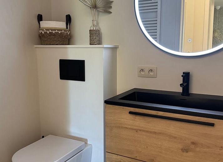 Vacation home in Merksplas, Antwerp, offers a cozy outdoor area with terrace surrounded by green nature for a relaxing stay.