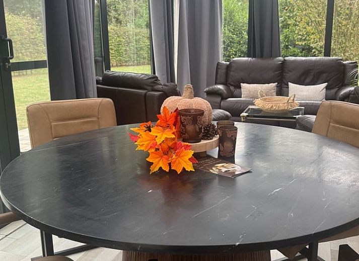 Autumn decoration at Holiday home in Merksplas, Antwerp. Cozy atmosphere with pumpkins and flowers for a cozy vacation home.