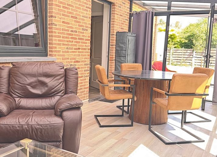 Autumn decoration at Holiday home in Merksplas, Antwerp. Cozy atmosphere with pumpkins and flowers for a cozy vacation home.