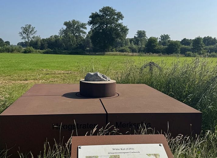 Vacation home in Merksplas, Antwerp, offers an inviting bedroom with a rustic feel for a relaxing stay.