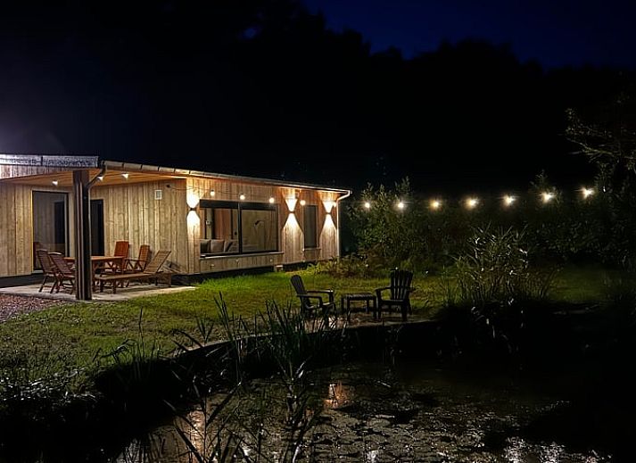 Rustiek vakantiehuis Huisje in Westmeerbeek omgeven door bos in Antwerpen, Belgie.