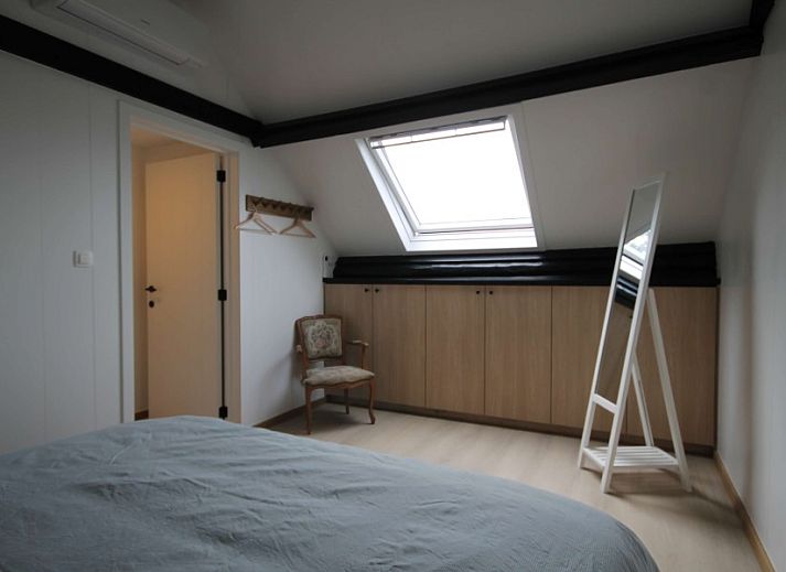 Essecke in Huisje Nostalgie, Ferienhaus in Laakdal, Antwerpen, mit Glastueren und Blick auf die Natur.