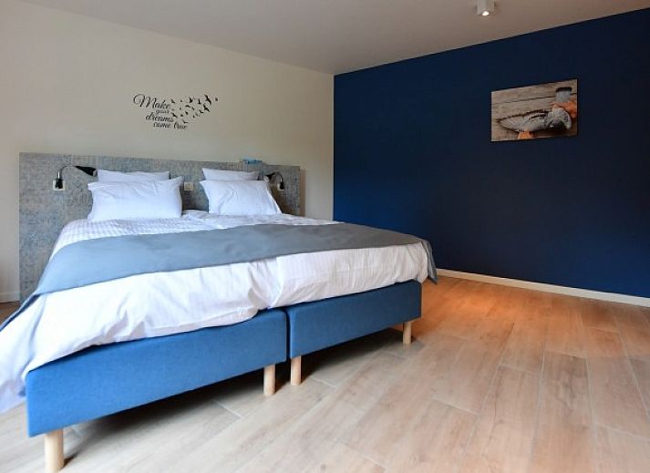 De Duivenmelkerij vakantiehuis in Meerhout, Antwerpen met charmante gevel en rode dakpannen.