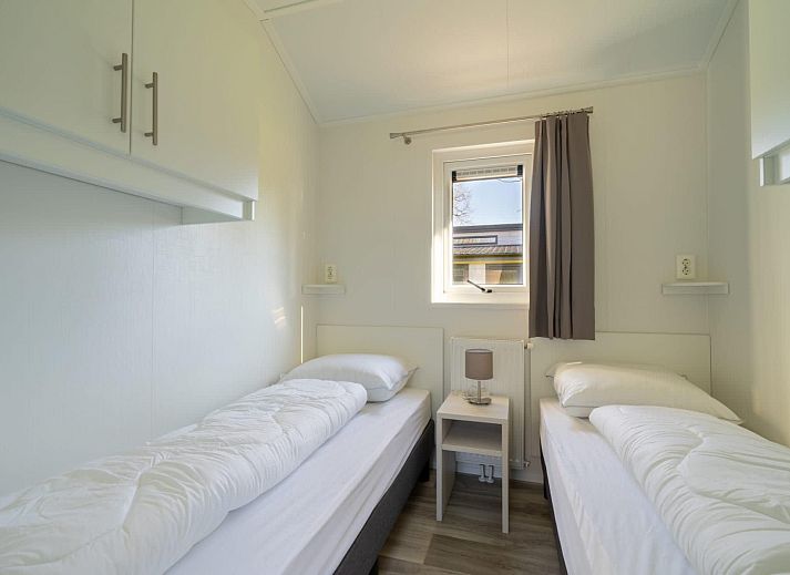 Cozy living room of vacation home Velthorst in Mol, Antwerp, Belgium, with modern decor and lots of natural light.