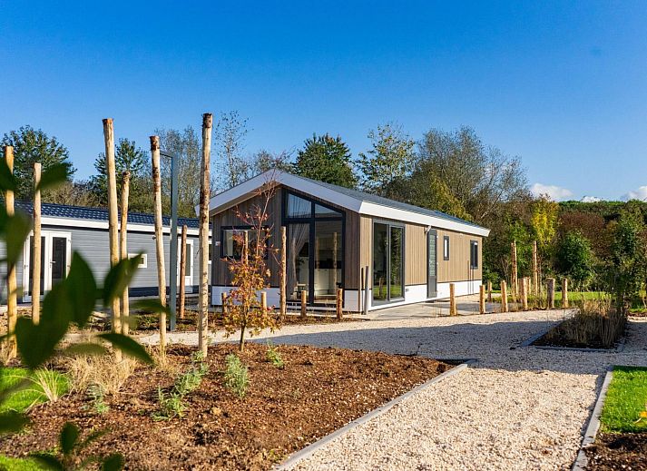 Cozy living room of vacation home Velthorst in Mol, Antwerp, Belgium, with modern decor and lots of natural light.