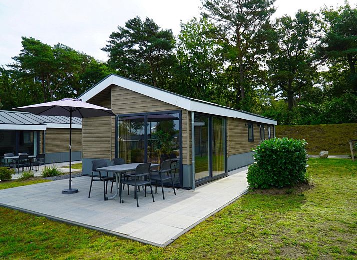 Cozy living room of vacation home Velthorst in Mol, Antwerp, Belgium, with modern decor and lots of natural light.
