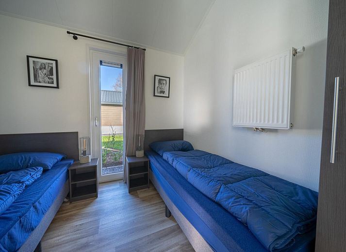 Modern kitchen and dining area in vacation home Velthorst, located in Mol, Antwerp, Belgium, with stylish decor and spacious layout.