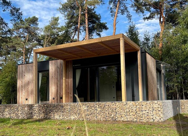 Chalet in Mol, ein Ferienhaus inmitten der Natur in Mol, Antwerpen, Belgien, mit modernem Design und grner Umgebung.