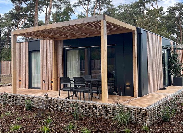 Gemtliches Wohnzimmer des freistehenden Hauses in 2400 Mol, Ferienhaus in Mol, Antwerpen, mit Blick auf die bewaldete Terrasse.