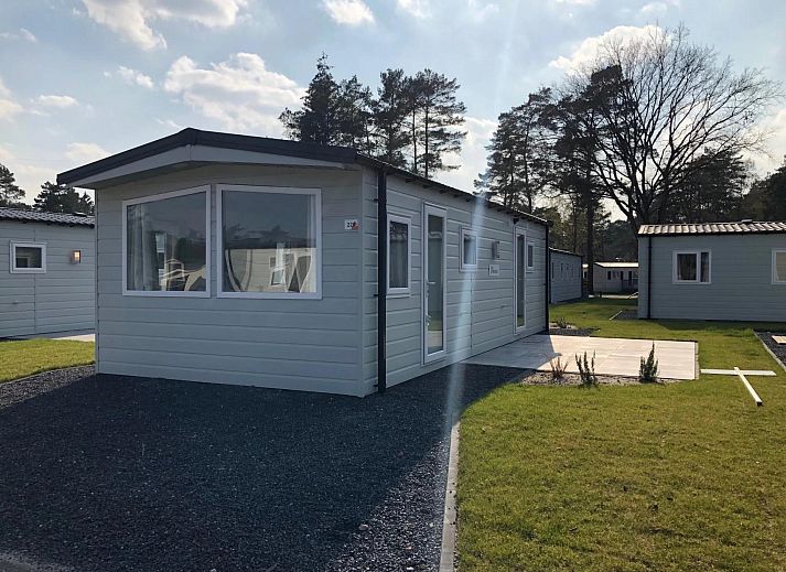 Berkel 4 vacation home in Mol, Antwerp, Belgium with modern exterior and green surroundings for a relaxing stay.