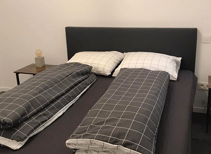 Vakantiehuisje in Retie, verscholen in het bosrijke landschap van Retie, Antwerpen, met een overzicht van de natuurlijke omgeving.