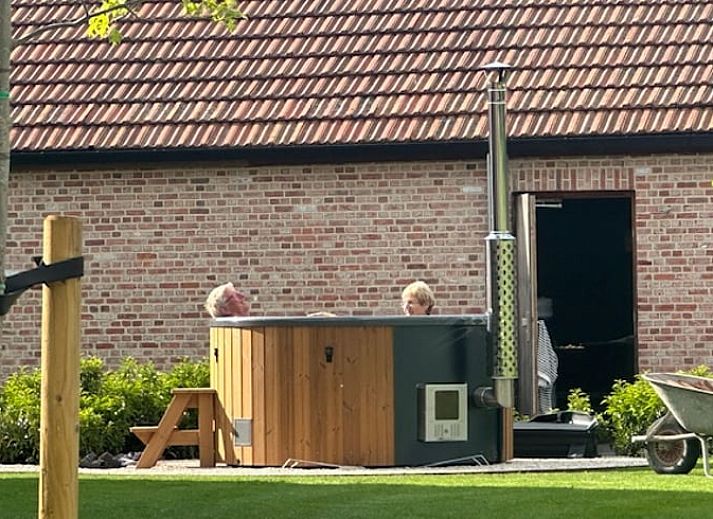 Modern vacation home in Kasterlee, Antwerp, surrounded by greenery and natural surroundings, ideal for a relaxing stay.