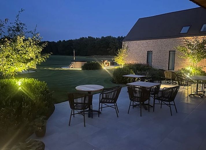 Modern vacation home in Kasterlee, Antwerp, surrounded by greenery and natural surroundings, ideal for a relaxing stay.